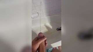 Just a hard cock peeing in the tub Max sizes