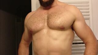 Bearded and muscled guy worships his pecks