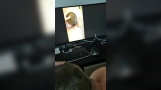 Sucking Master's cock in front computer while he watches a video me sucking him BottomSlutCO