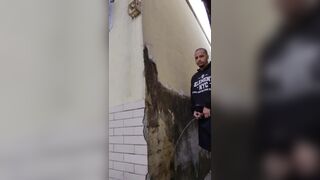 dude freeing a lot pee in a wall nathan nz