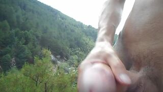 Wank with a view. Masturbation on a mountain. Touching my slim, oiled body outdoors. Curved-dick