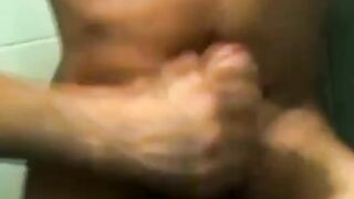handsome deviant masturbating passionately in bath