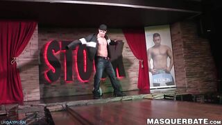 muscular hunky stripper stroking his massive cock solo