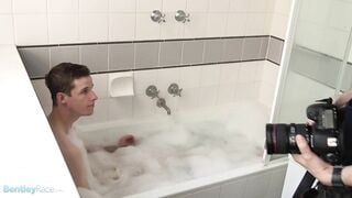 Brad Hunter playing with his thick cock in the bath