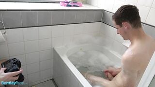 Brad Hunter playing with his thick cock in the bath