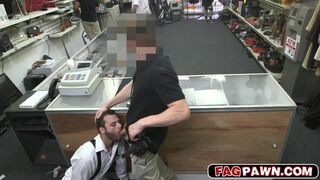 dude sucks dick behind a counter while other customers shop